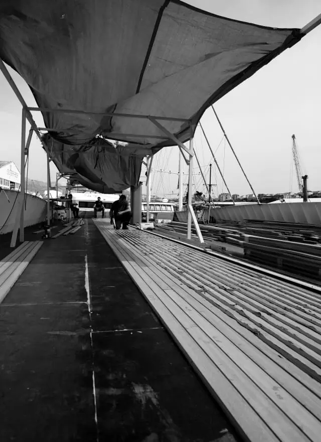 Yacht deck under a work awning